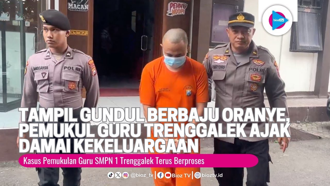 Tampil Gundul Berbaju Oranye, Tersangka Pemukul Guru Trenggalek Ajak Damai Kekeluargaan - bioztv