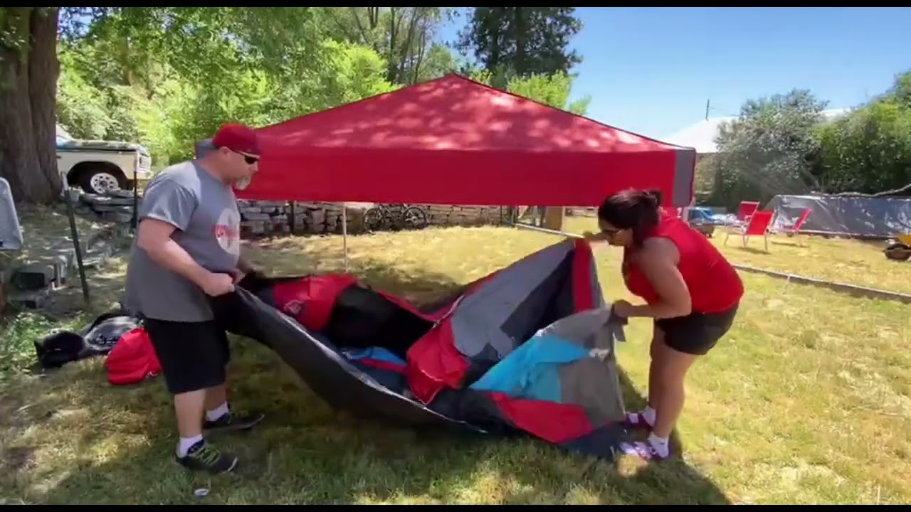 How To set up an Ez Up 6.4 Cube tent system and review.