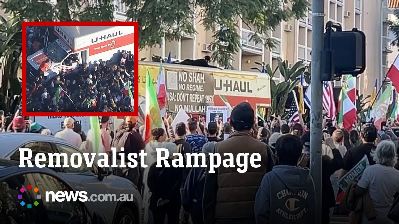 Removalist truck drives through a crowd of anti- Iranian regime protesters in LA