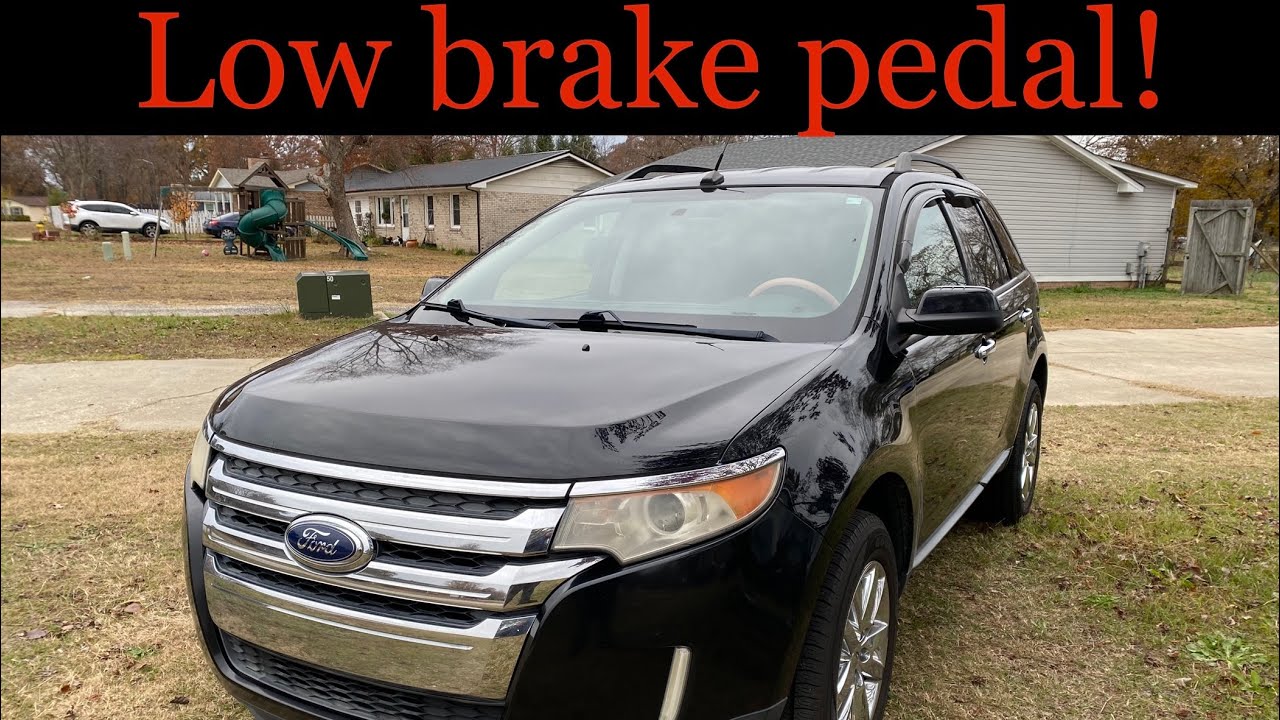 Как исправить низко расположенную педаль тормоза в Ford Edge 2011 года.