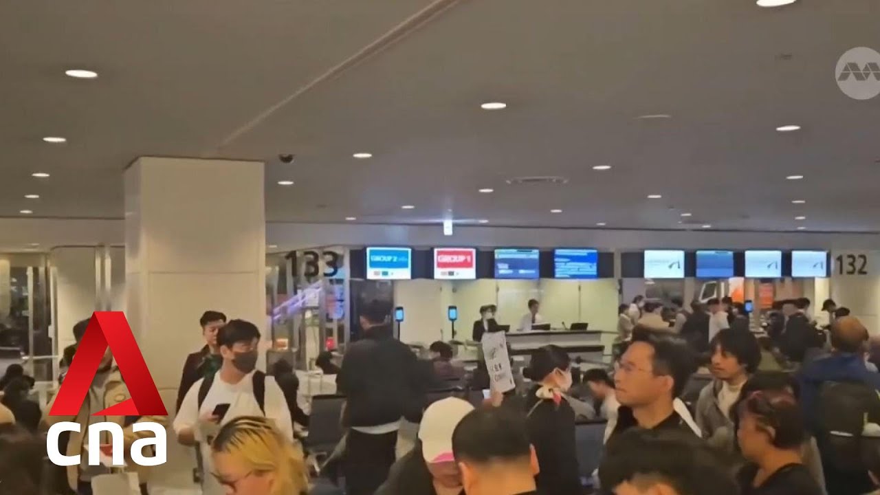 All runways at Tokyo's Haneda airport closed after Japan Airlines plane catches fire