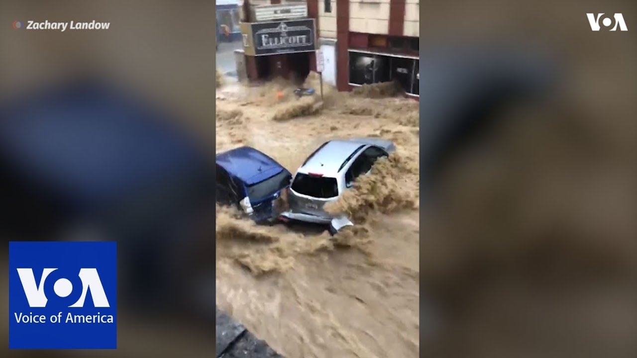 Cars swept away as flash floods rage through Ellicott City, Maryland