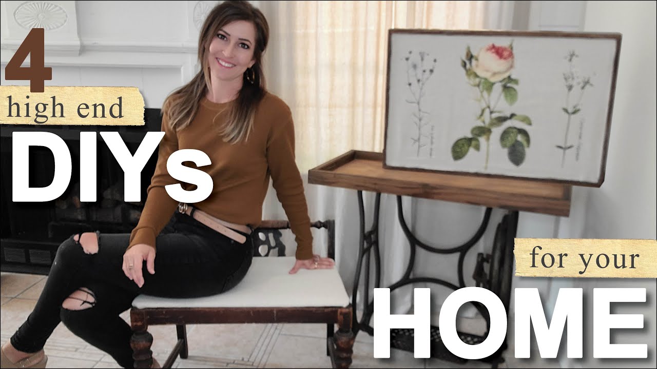 High End DIYs for Your Home • drop cloth curtains • end tables • art work • upholstered stool