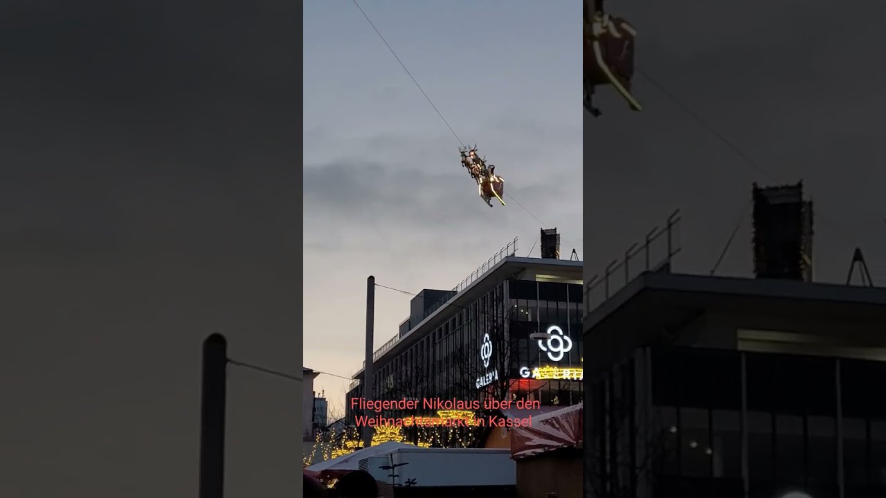 fliegender Weihnachtsmann über den Weihnachtsmarkt über Kassel