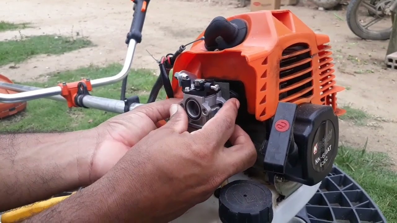 trocando o carburador da Roçadeira nakasaki 63cc 3hp