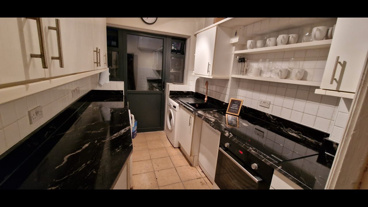 Cosmic Black Granite, Nilestone, installed in kitchen, @londonkitchenworktops