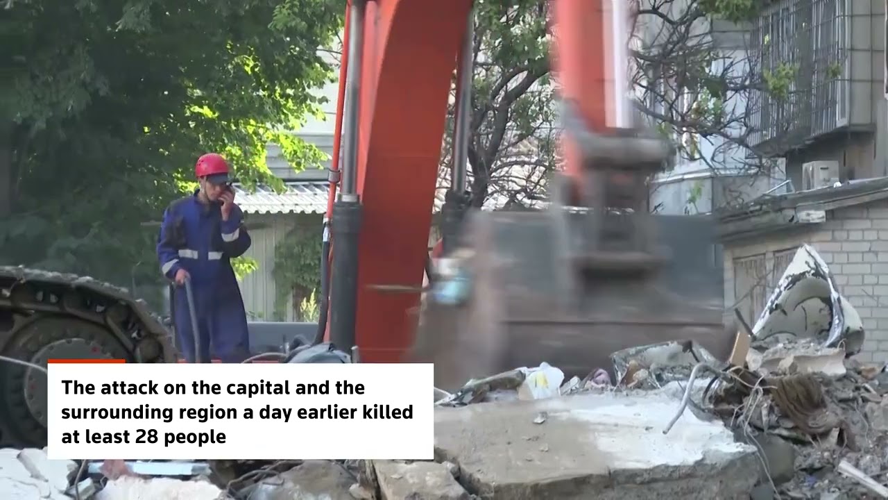 Cleanup crews return to Kyiv building hit in Russian attack