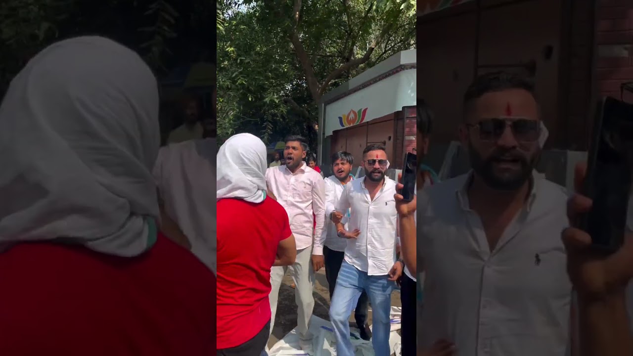 ​Congress Workers Tear Down PM Narendra Modi's Poster During Heated Protest