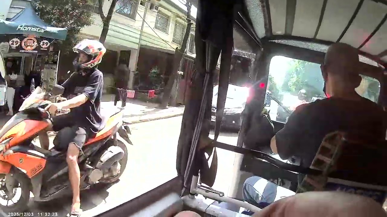Taking the tricycle through the streets of Antipolo City  Philippines part 2 of 3.