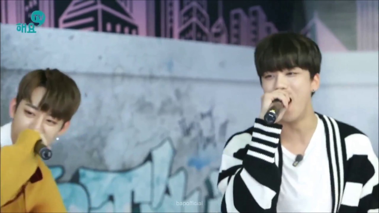B.A.P's Youngjae laughing whilst performing