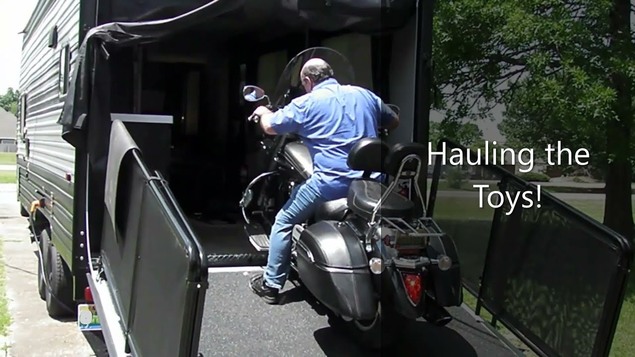 Loading our Forest River 18 RR Toy Hauler: Affordable, Reliable Tie Down System