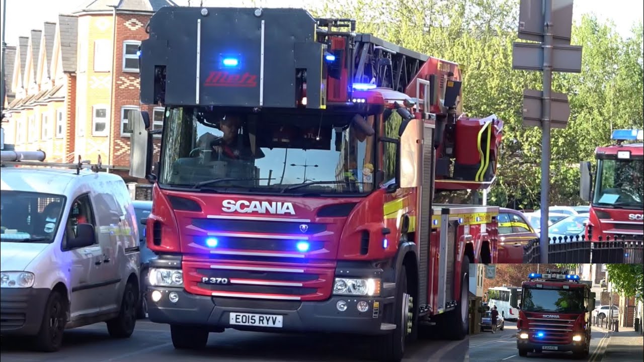 Surrey Fire & Rescue Service, turntable ladder & two pumps, responding in Guildford to an emergency.