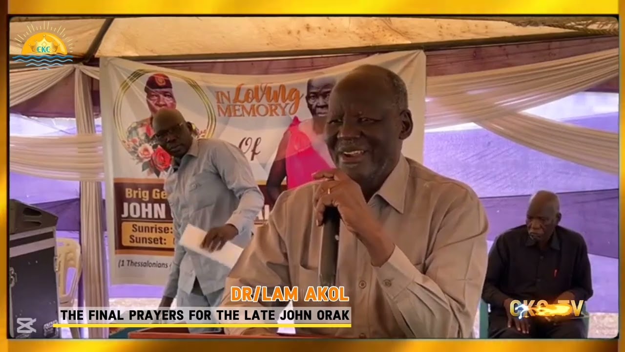  Dr/lam Akol During the finally praying of late/John Orak 