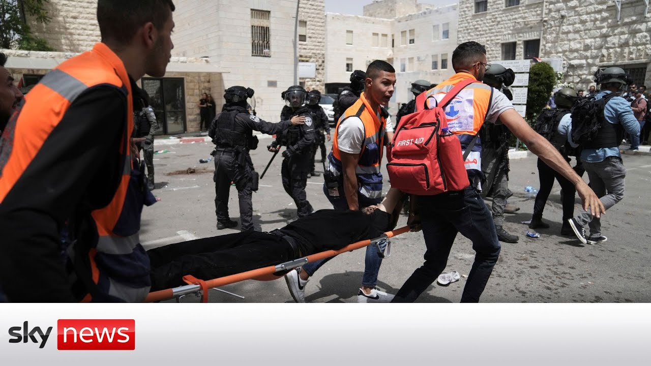 Israeli forces attack mourners at Al Jazeera journalist's funeral