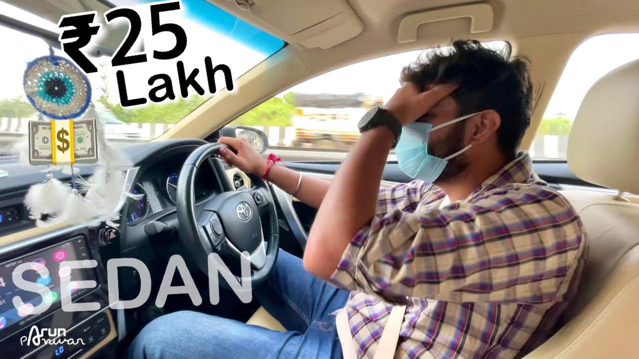 Driving Toyota Corolla Altis woth ₹25 Lakh