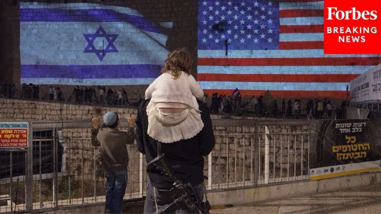 Israeli And American Flags Are Shown In Jerusalem As Israel Eagerly Awaits Return Of 40 Hostages