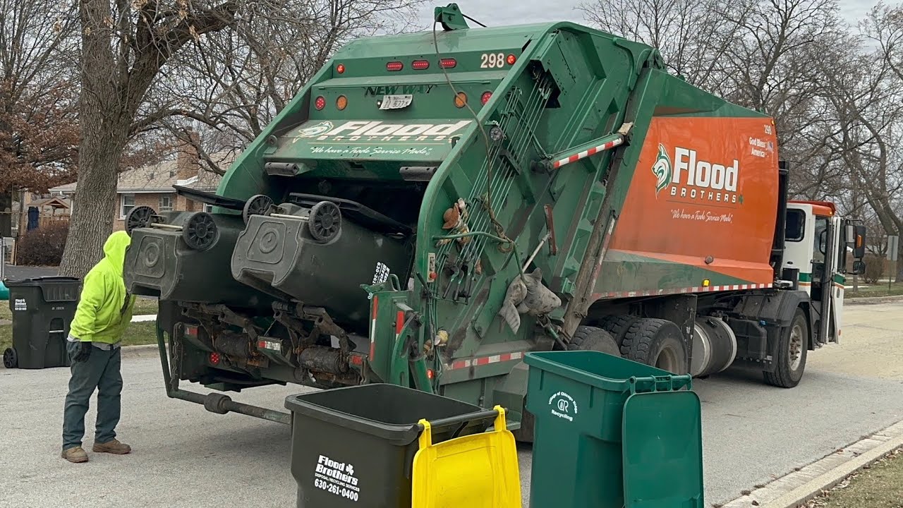 Very Fast Flood Brothers Driver Packing Trash with a Battle Raider New Way Rear Loader Garbage Truck