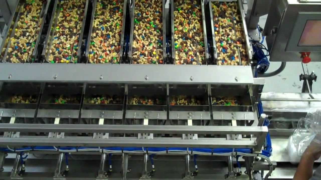 Clamshell Filling Trail Mix / Lakewood Process Machinery