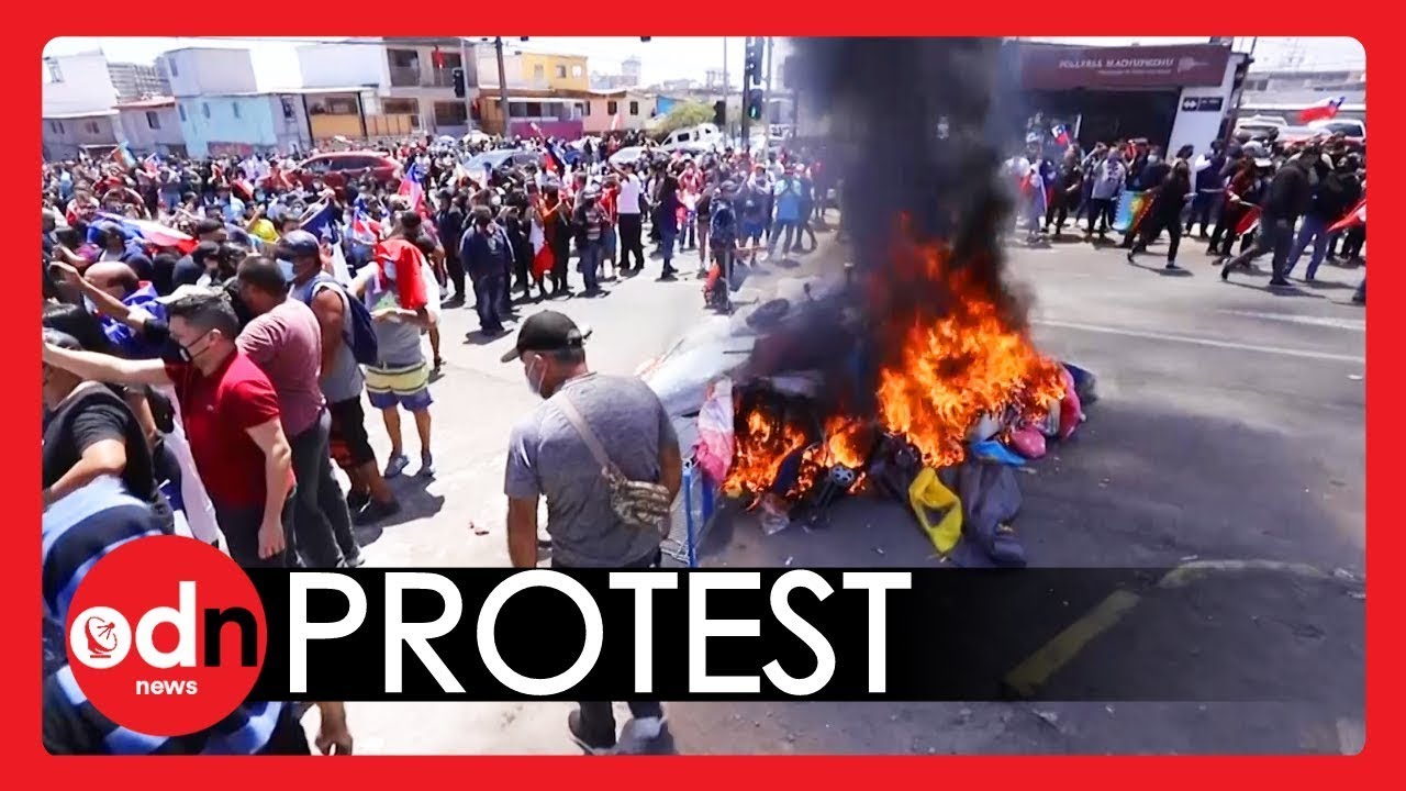 Migrant Belongings BURNED in Chile Protest