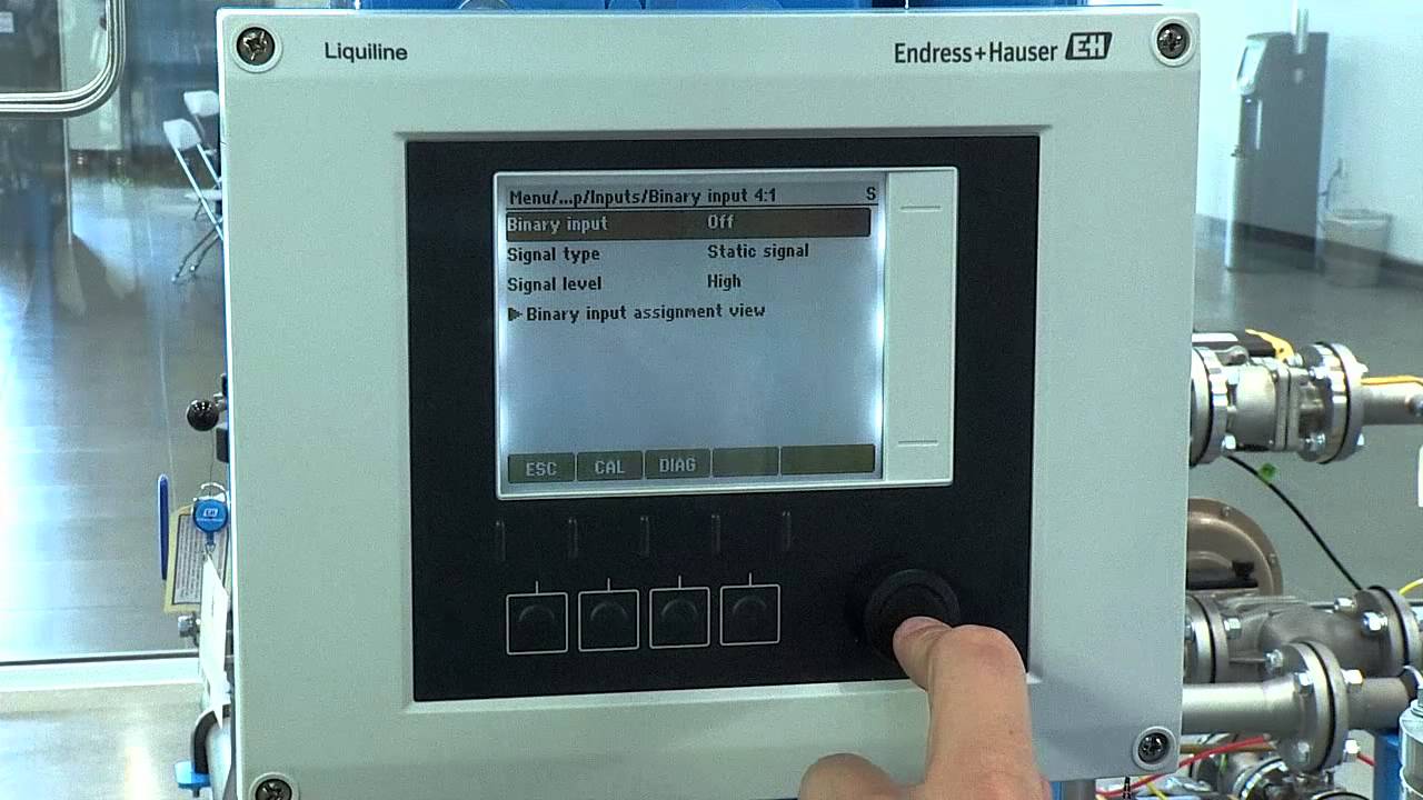 Setting up a binary input on the CM44 Transmitter