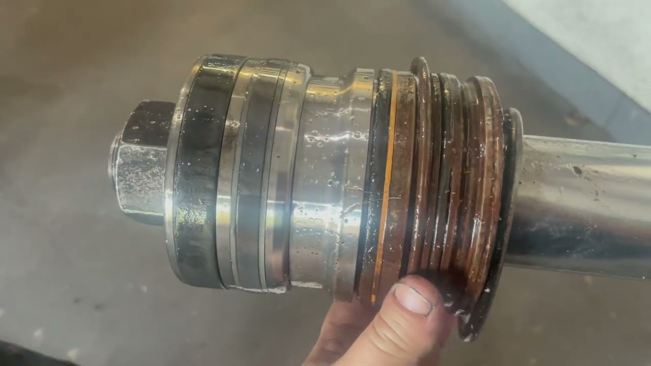 Rebuilding A Hydraulic Cylinder On A John Deere Feller Buncher