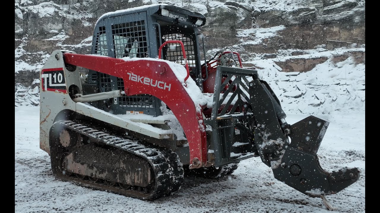 Operating a skid steer tree shear