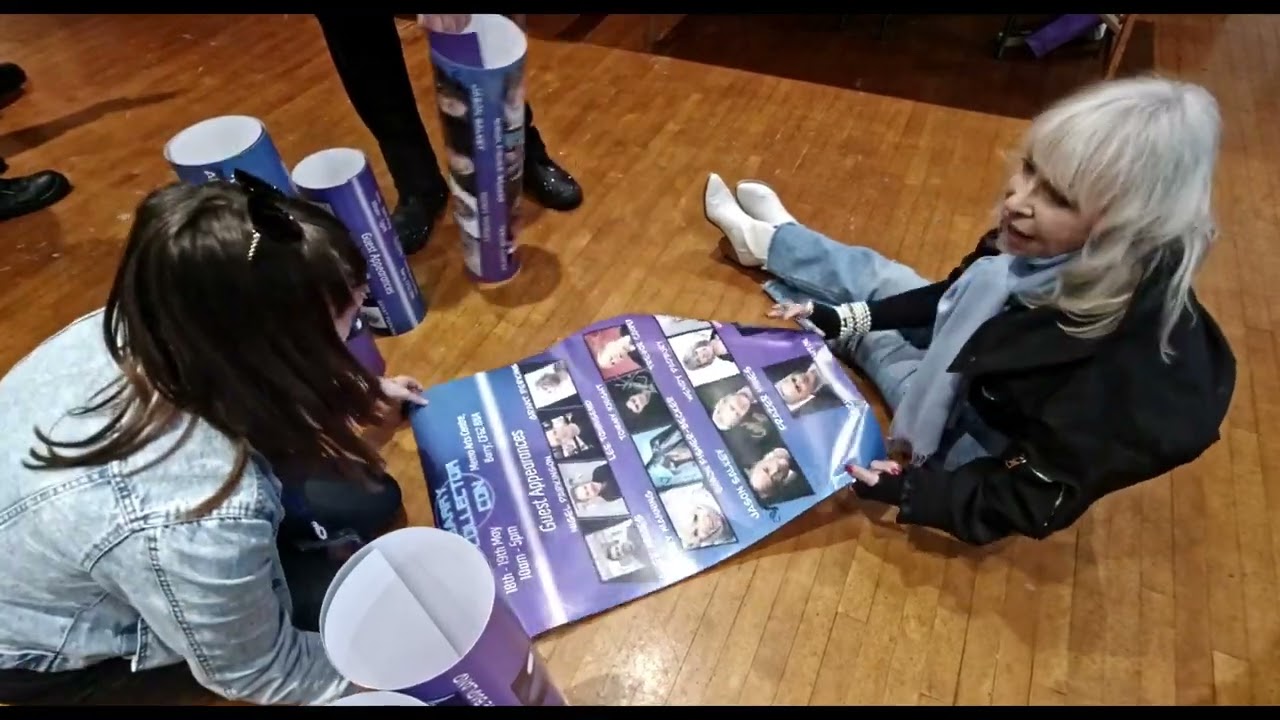 Katy Manning signing our poster at barry collector con may 2024