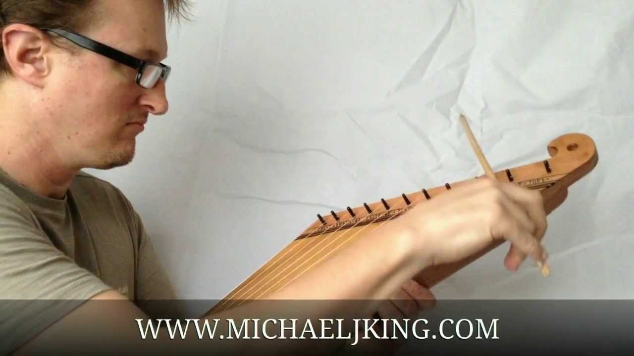 11 String Kantele, (decorated), plucked and played as a Tenor Bowed Psaltery