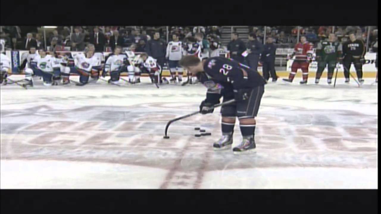Ryan Keller (OKC) and Kevin Connauton (CHI) Tip of the blade breakaway attempt