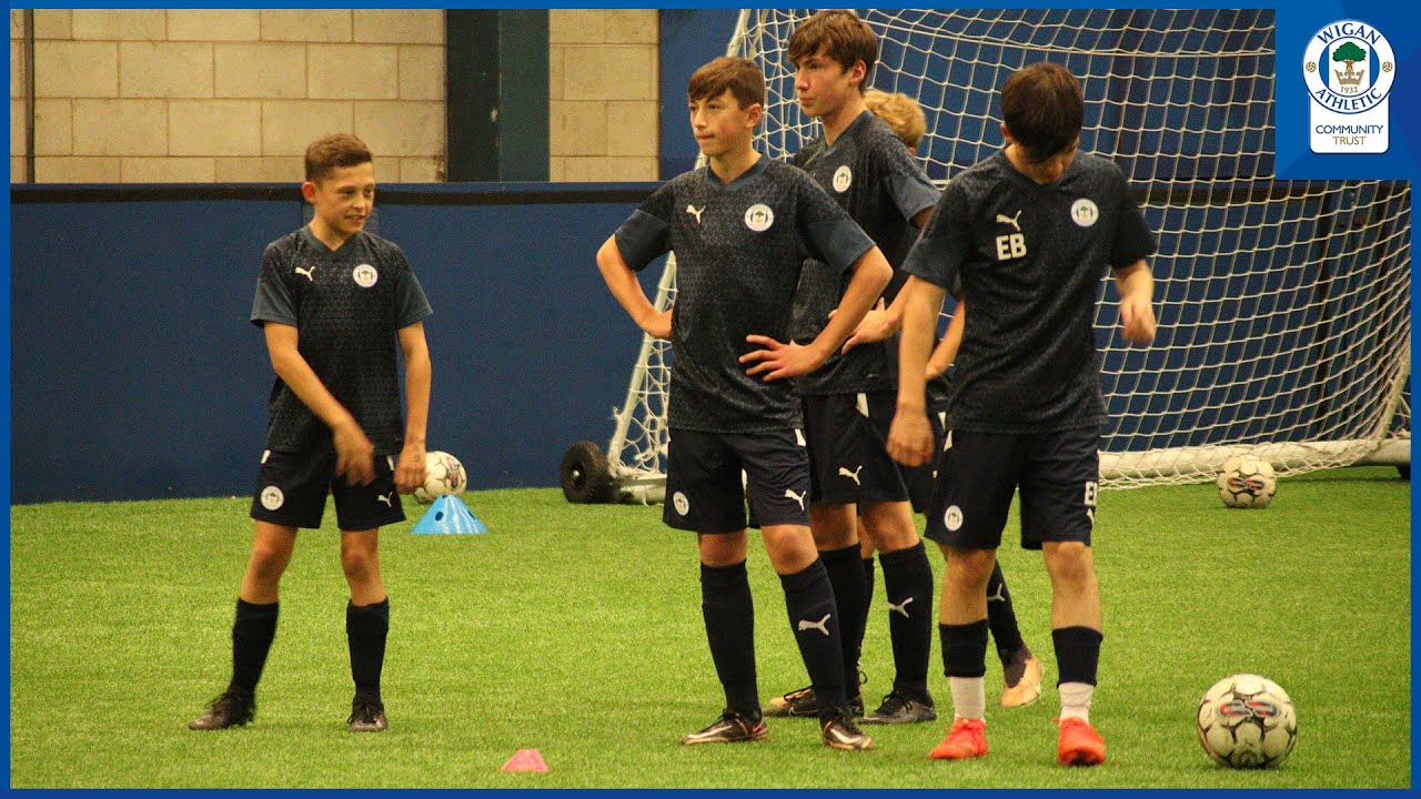 Community | Three players progress into Latics Academy through Community Trust development centres