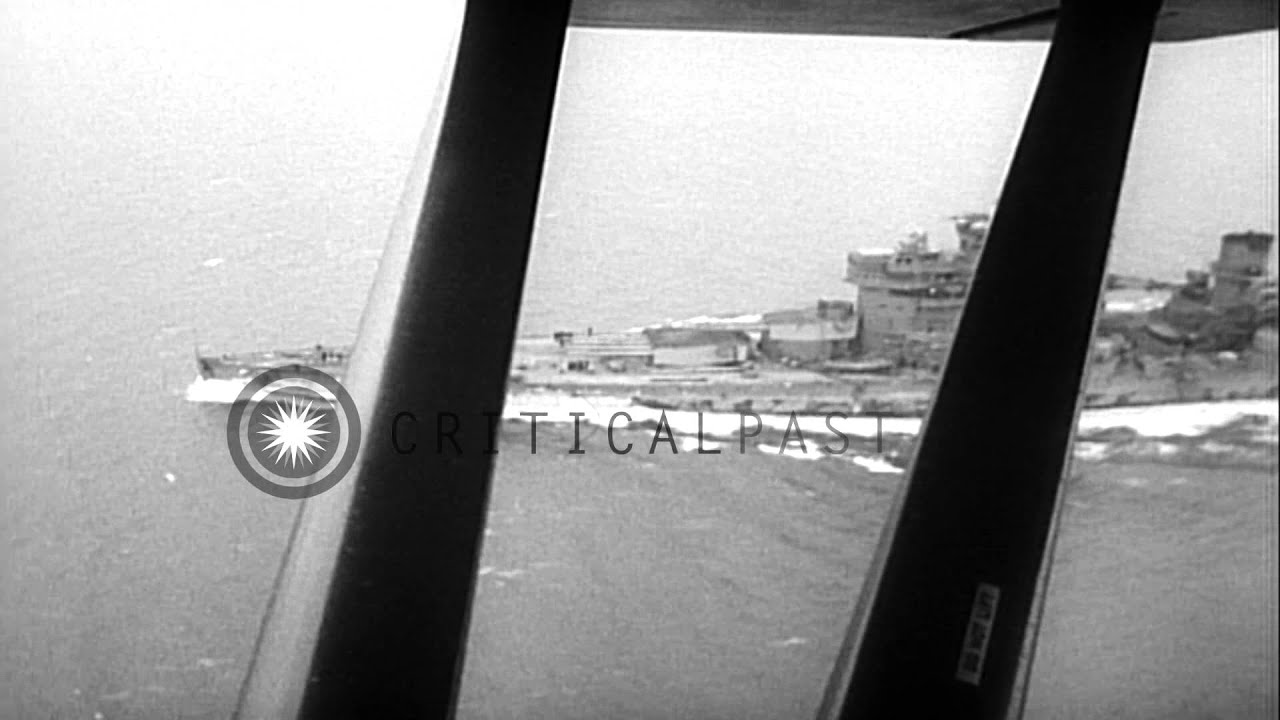 Aerial views of British Battleship, HMS King George V, underway, at sea HD Stock Footage