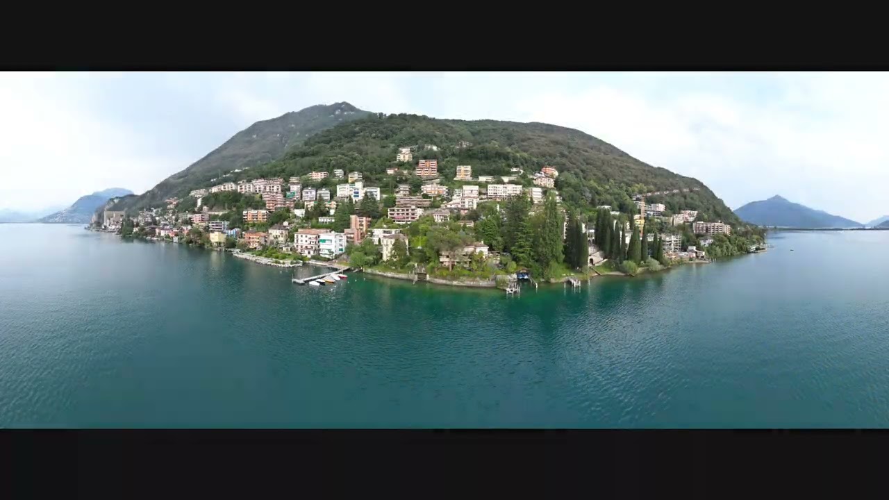 Drone Fly over Lake Lugano in Bissone, Switzerland