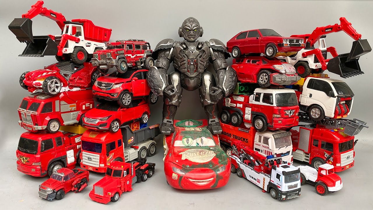 B&atilde;i Đỗ Xe &Ocirc;t&ocirc; đồ chơi Lắp r&aacute;p biến h&igrave;nh m&agrave;u đỏ - Đại Chiến Qu&aacute;i Th&uacute; Kong, McQueen, Bumblebee