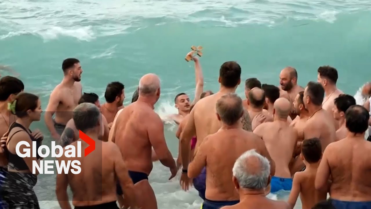 Orthodox Christians across the globe take icy plunges to celebrate Epiphany