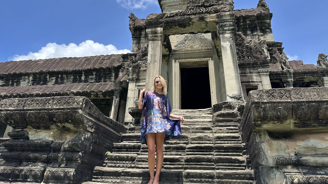 GROUNDING ON THE SACRED,  HALF SWALLOWED BY THE JUNGLE BUDDHIST AND HINDU TEMPLES OF THE ANGKOR WAT