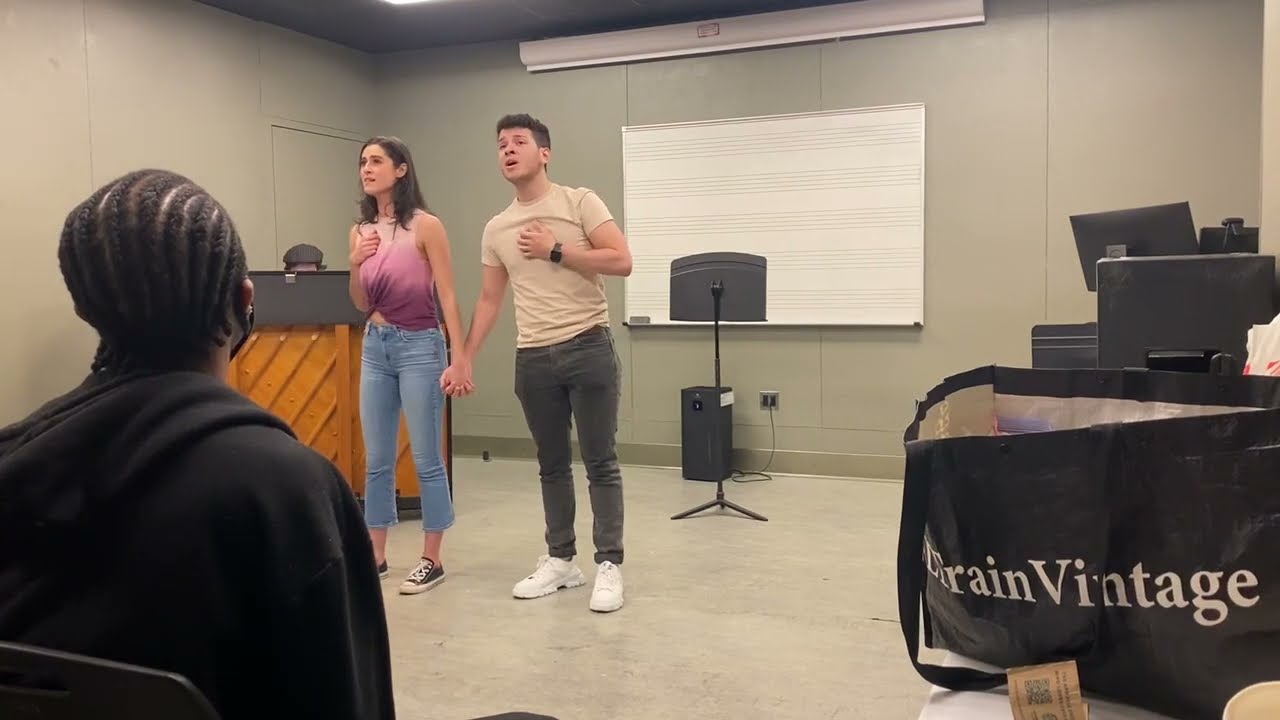 Zoe Constantinides and Chris Arredondo singing 
