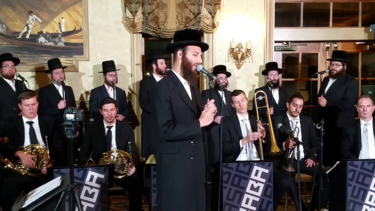 Beri Weber and Shulem Lemmer sing the Chuppah with Shirah choir