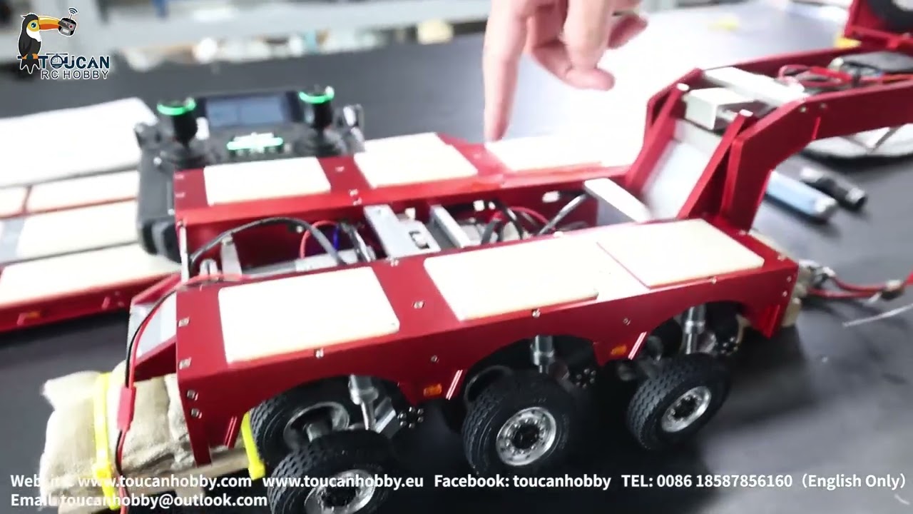 The operation of  1/14 DG 996 RC hydraulic trailer , 8 axles with hydraulic suspension