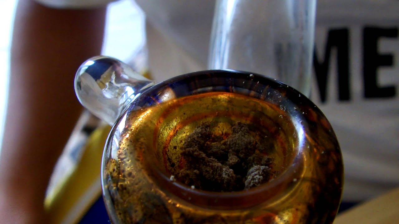 Close up hash bowl with some OG Kush wax melting