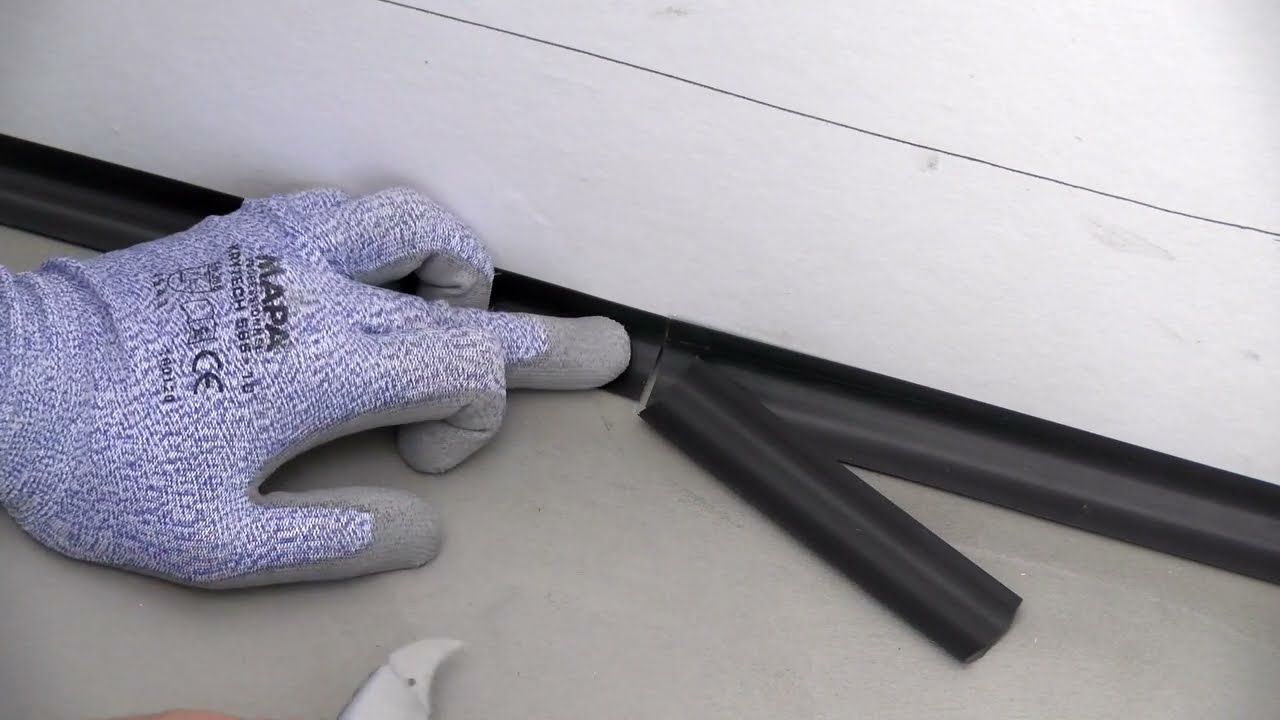 How to fit PVC cove former for vinyl flooring & wall?