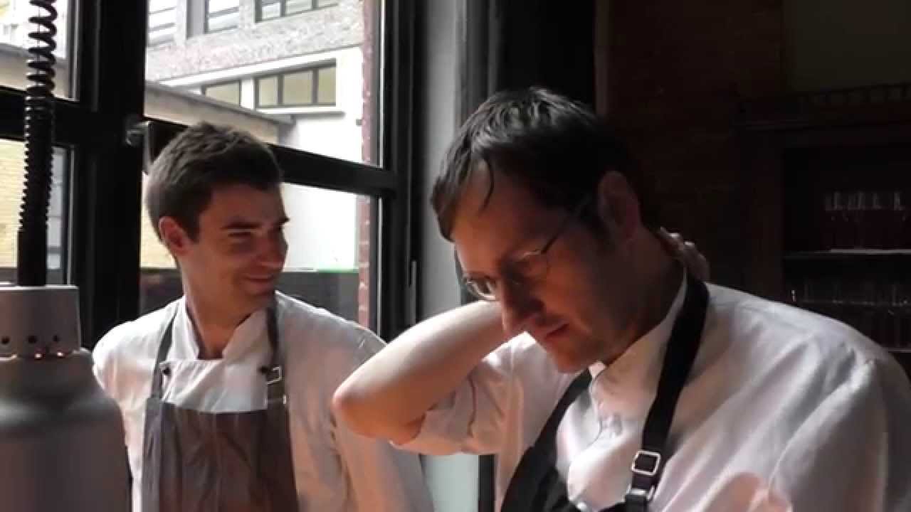 Daniel Achilles prepares a main course at the Michelin star Reinstoff in Berlin