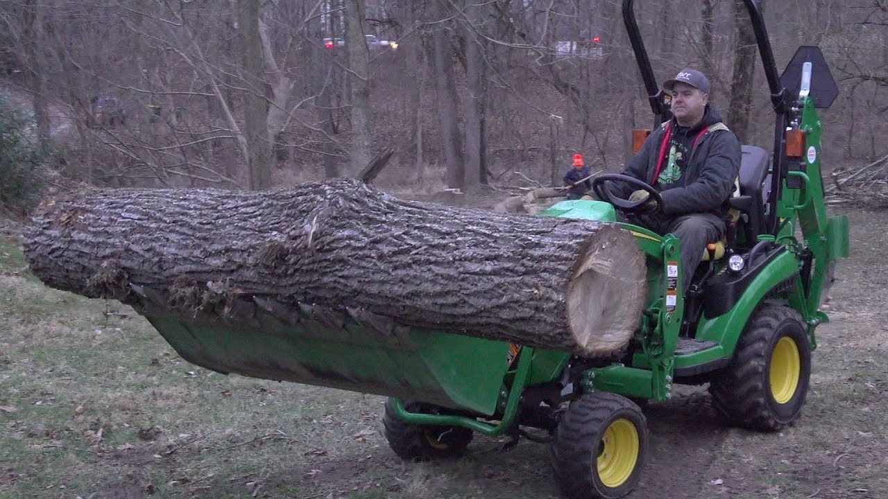 Can A John Deere 1025R Move and Load Huge Walnut Logs?