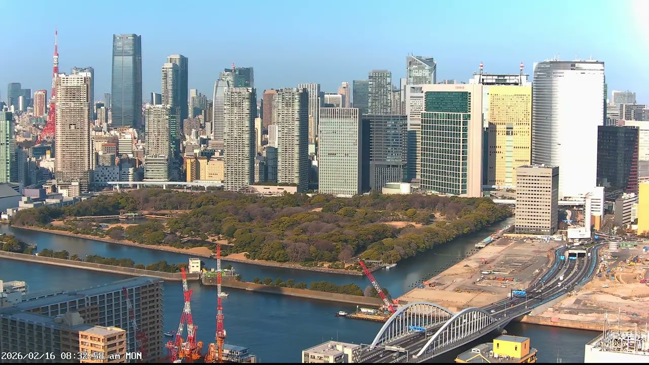 東京ライブカメラ 4K | 港区・築地 | 夕焼けと都心の景色 | 2026-02-16