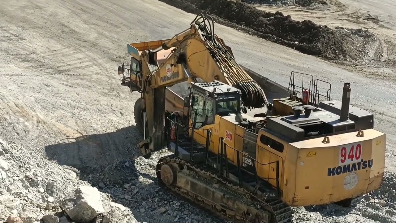 Komatsu PC1250 Excavator Loading Dump Trucks | Heavy Mining Power