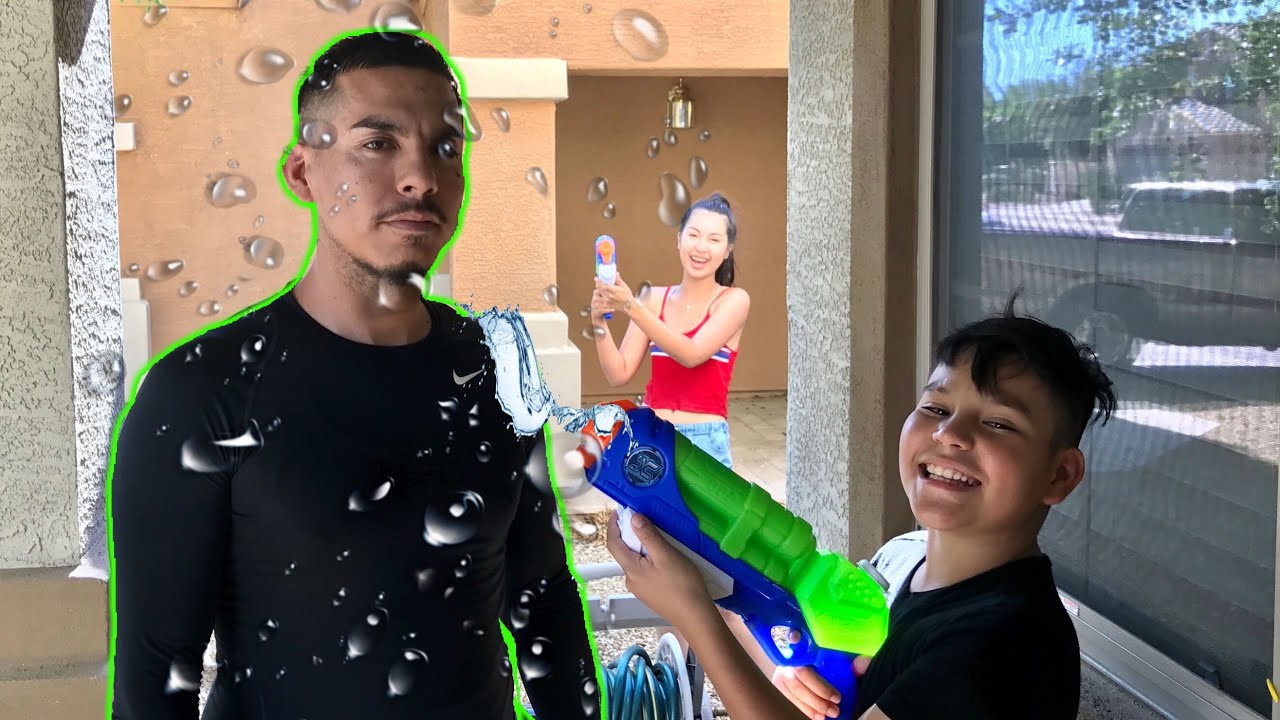 WATER GUN PRANK ON DAD!!! *WATER WAR*