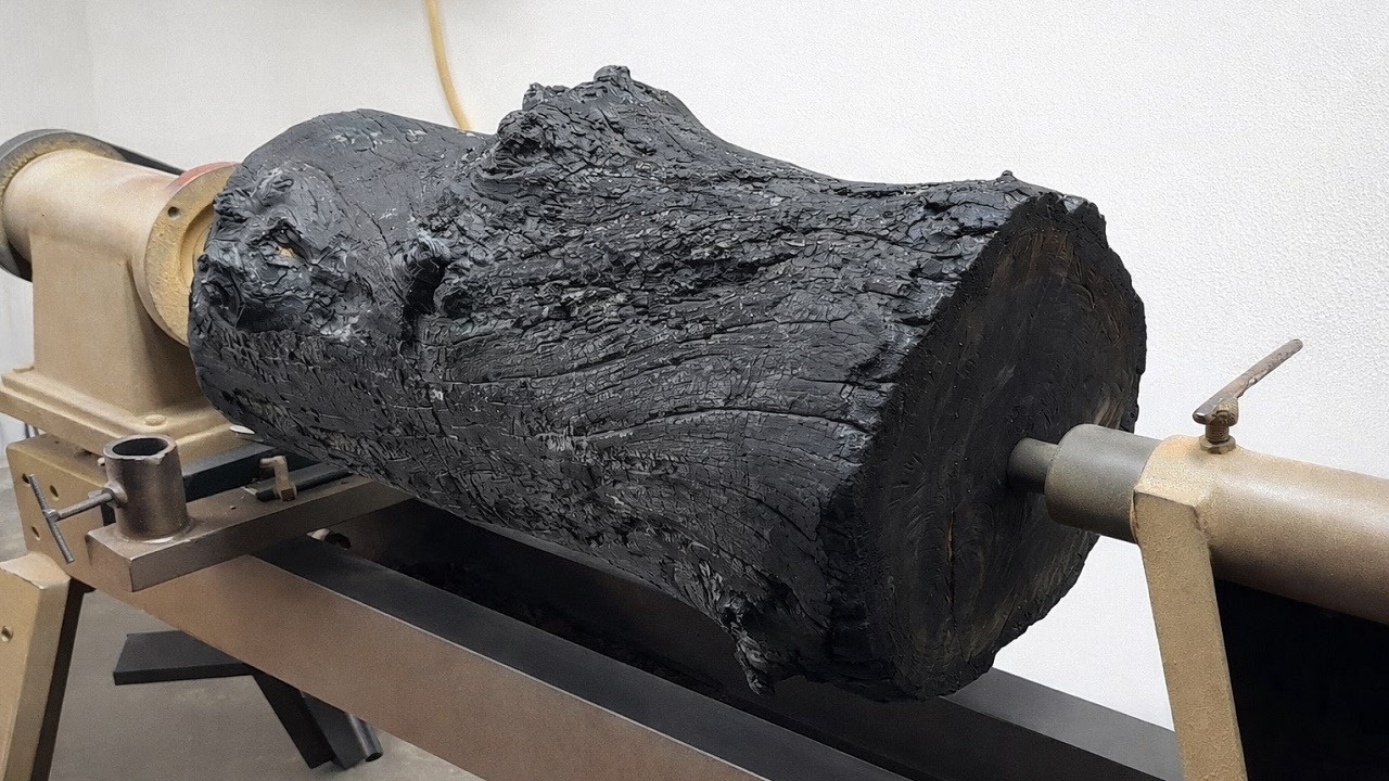 Dark Elegance Witness the Birth of a Masterpiece from Fire Damaged Wood