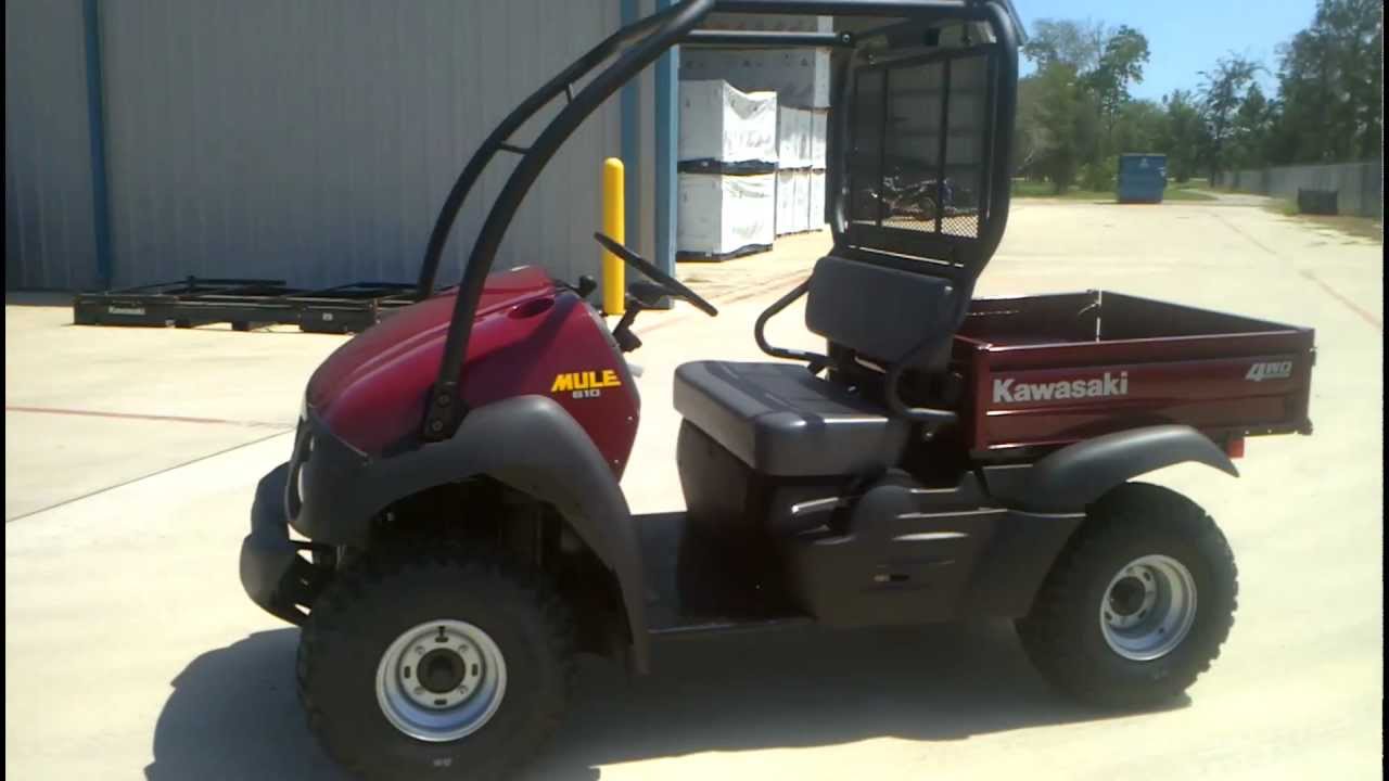Обзор и рецензия: внедорожник Kawasaki Mule 610 4X4 темно-королевского красного цвета 2012 года в...