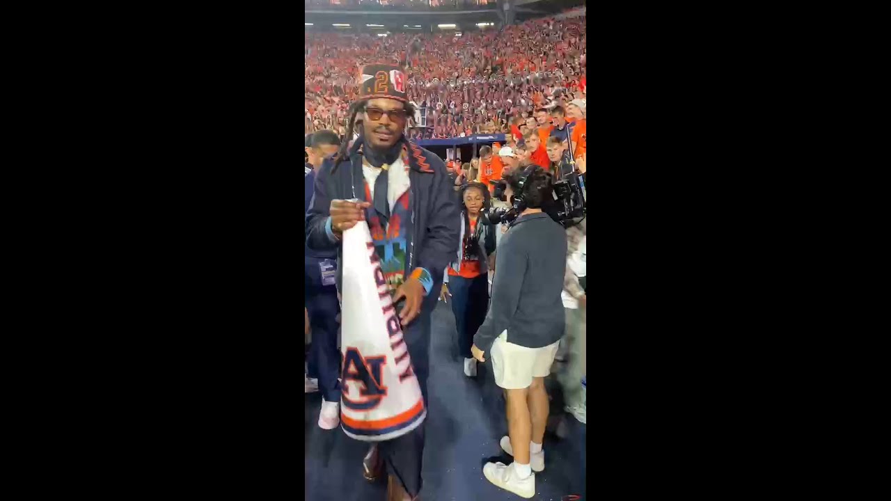 Atlanta's own Cam Newton greeted at Georgia-Auburn game