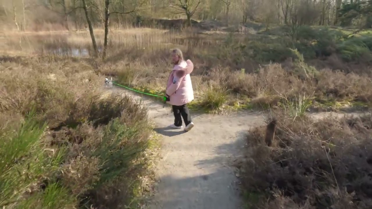 Fietsen met Rex in Hondenkarretje