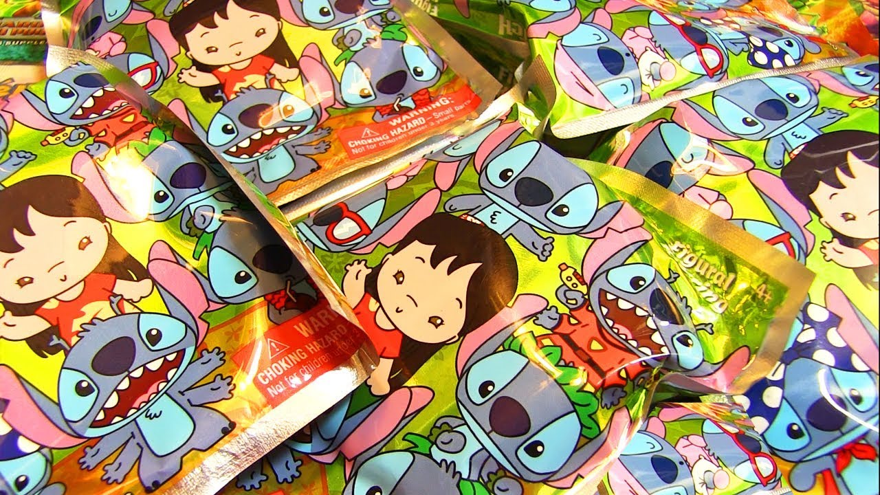 PLEIN DE STITCH GENIAUX ! OUVERTURE DE 5 BOOSTERS DISNEY LILO & STITCH !